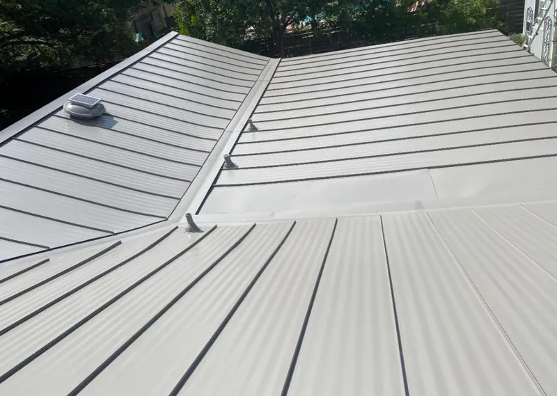Solar attic fan installed on a metal roof for Roof Ventilation in South Pasadena